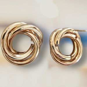 Fashion jewelry golden twisted knot